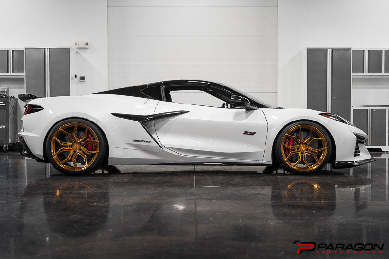 Shown is Paragon front lift collars, 3/8 riser shims, Factory Rear Coilover turned down 3/4 of an inch & Lowering Springs