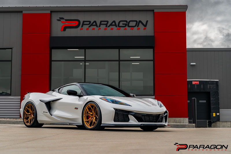 Shown is Paragon front lift collars, 3/8 riser shims, Factory Rear Coilover turned down 3/4 of an inch & Lowering Springs